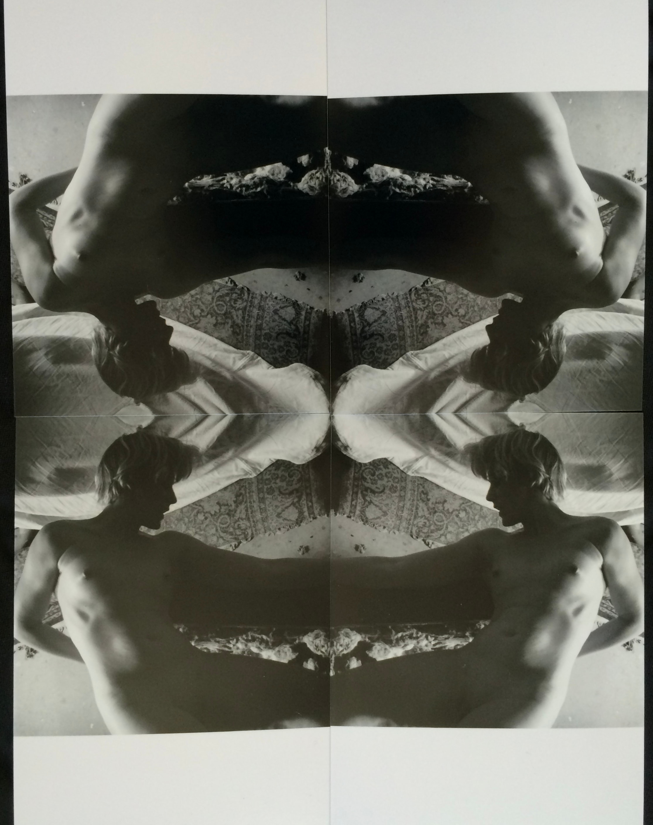 Repeated monochrome body fragments mirrored across a grid of photographic panels