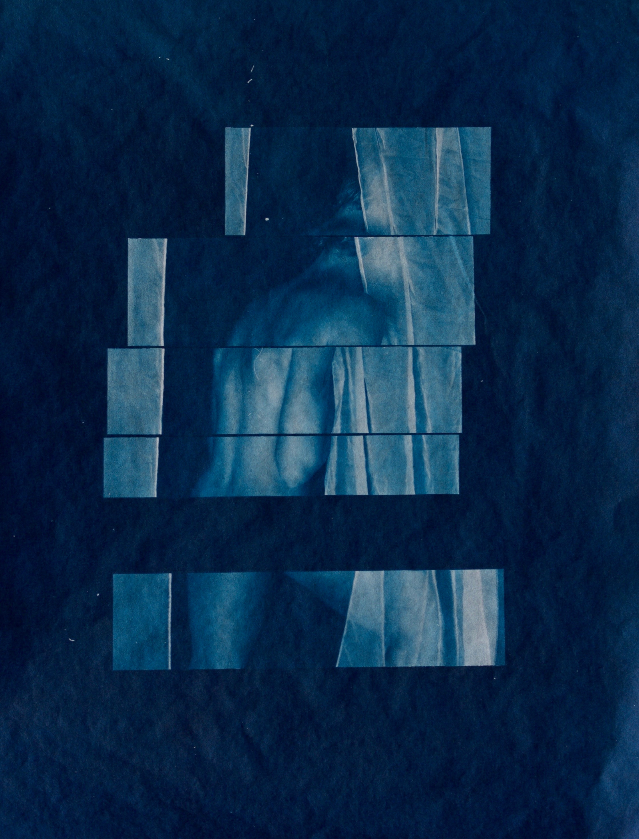 Rectangular fragments of a figure arranged across a deep blue background