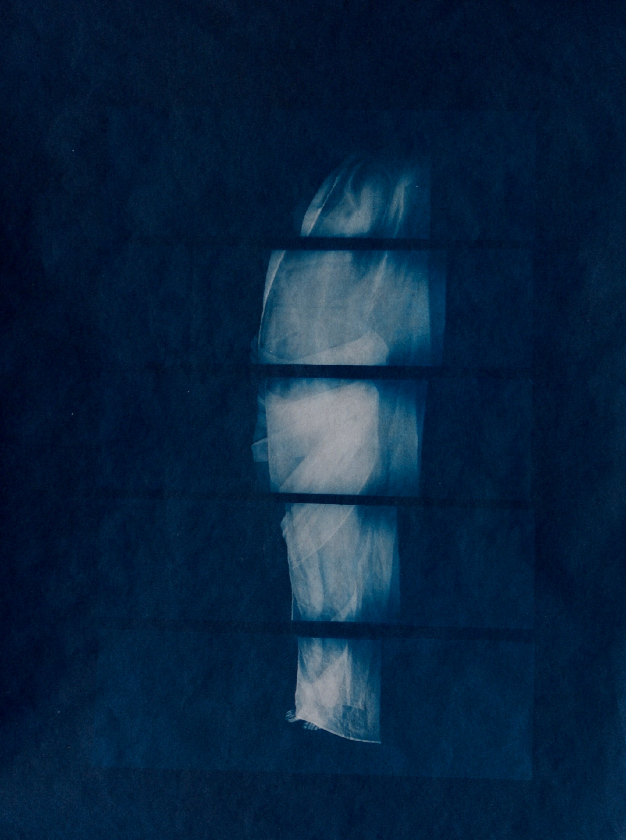 A vertical body form divided into horizontal bands on a deep blue background